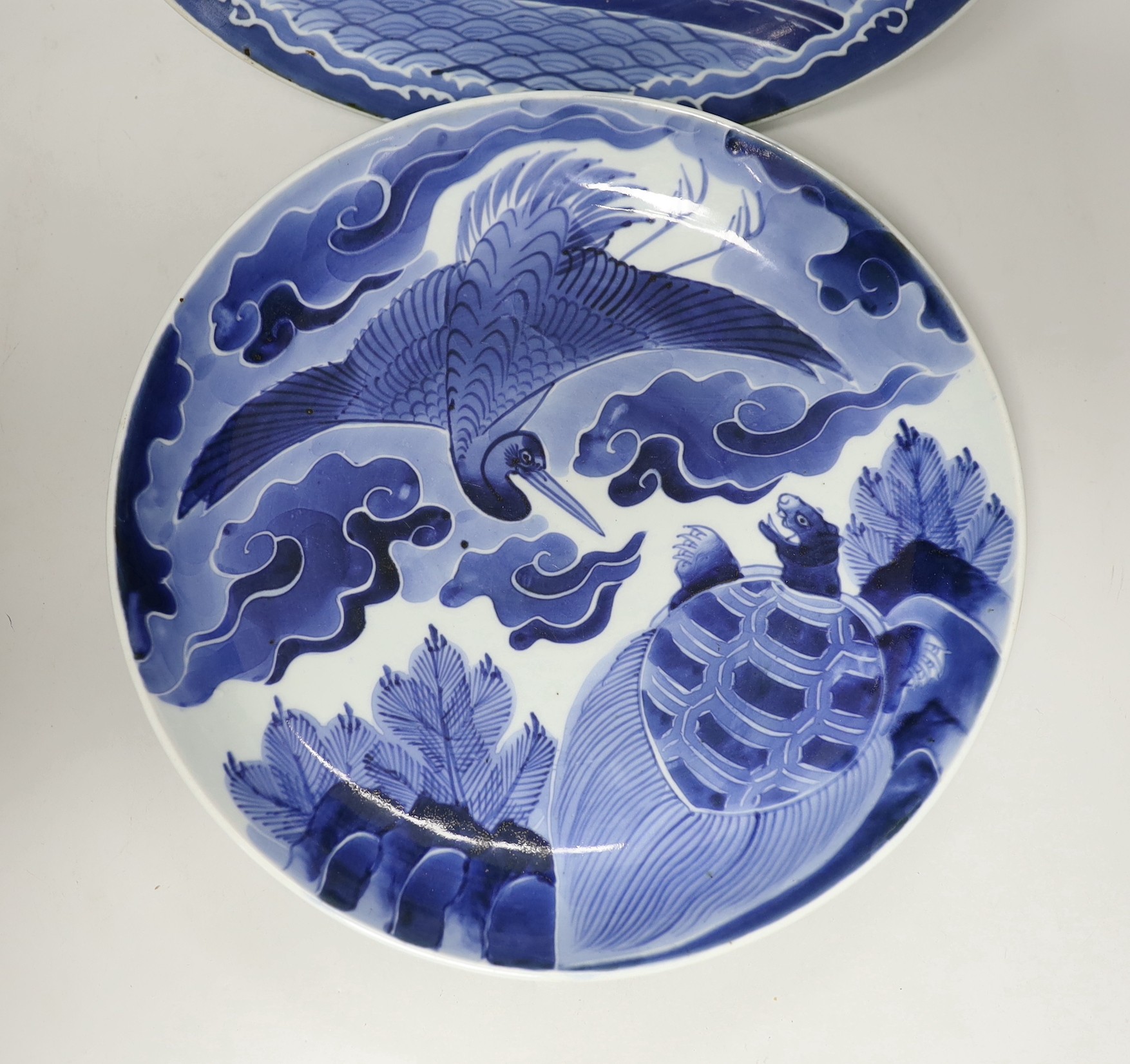 Two Japanese blue and white dishes, late Edo period, 33cm diameter, one with apocryphal Chenghua mark